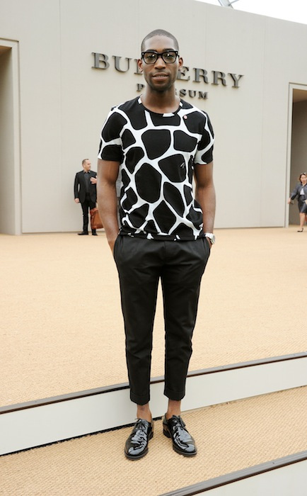 LONDON, ENGLAND - JUNE 18:  (EMBARGOED FOR PUBLICATION IN UK TABLOID NEWSPAPERS UNTIL 48 HOURS AFTER CREATE DATE AND TIME. MANDATORY CREDIT PHOTO BY DAVE M. BENETT/GETTY IMAGES REQUIRED)  Tinie Tempah arrives at Burberry Menswear Spring/Summer 2014 at Kensington Gardens on June 18, 2013 in London, England.  (Photo by Dave M. Benett/Getty Images for Burberry) *** Local Caption *** Tinie Tempah
